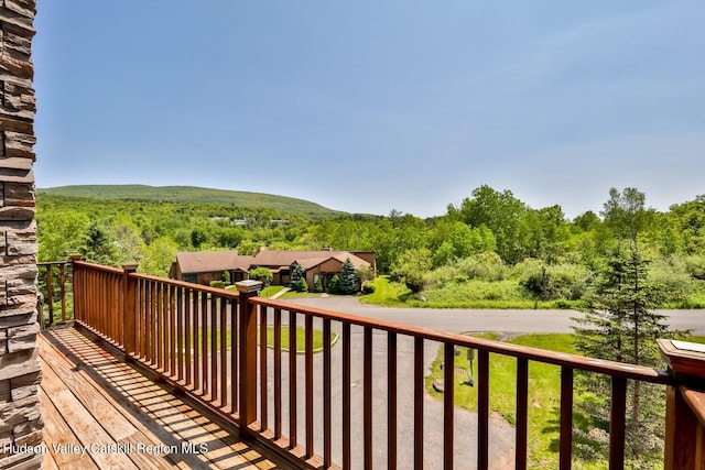 6 Trailside Dr Unit A8, Hunter, NY 12442 - wooden terrace with a wooded view
