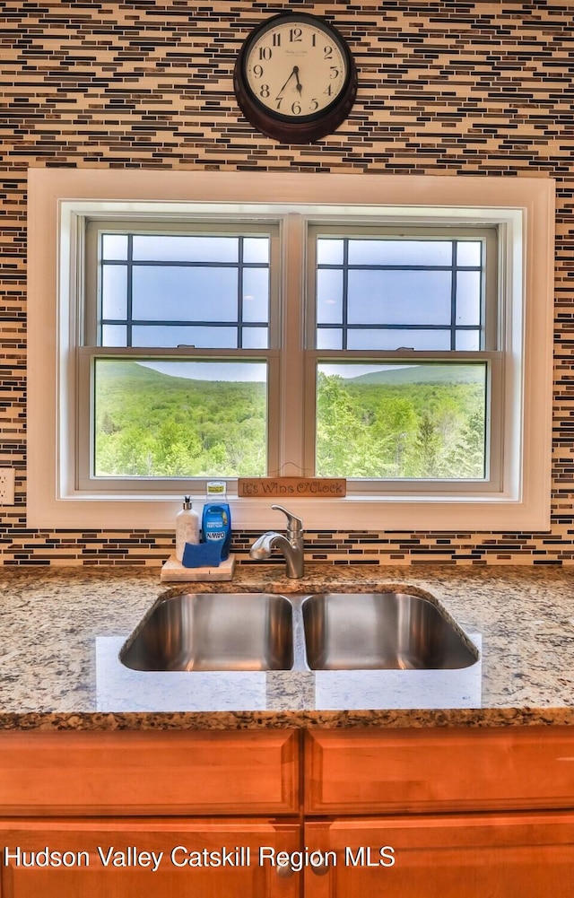 6 Trailside Dr Unit A8, Hunter, NY 12442 - kitchen view of tasteful backsplash and light stone counters