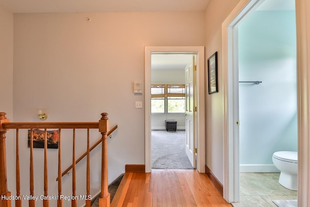 6 Trailside Dr Unit A8, Hunter, NY 12442 - hall with an upstairs landing and light wood-type flooring