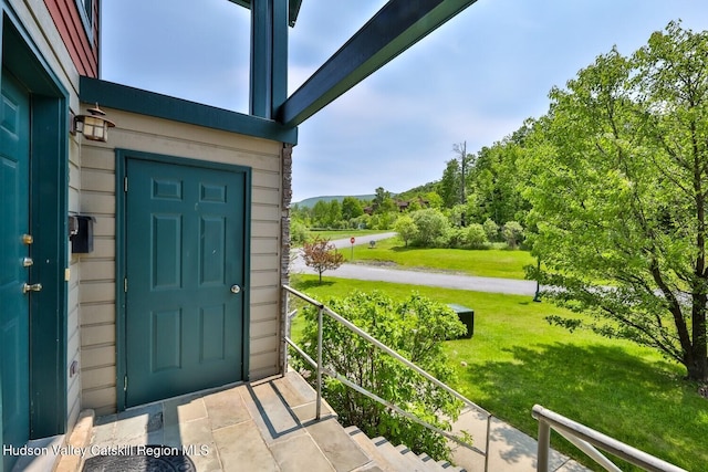 6 Trailside Dr Unit A8, Hunter, NY 12442 - view of exterior entry with a yard