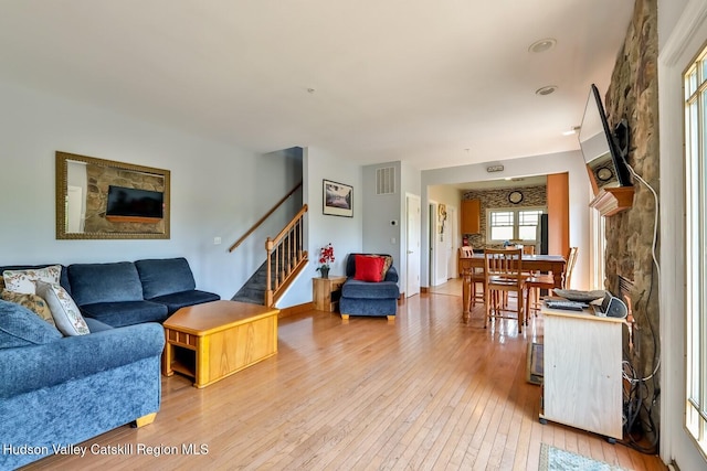 6 Trailside Dr Unit A8, Hunter, NY 12442 - living room with light wood-style flooring and stairs