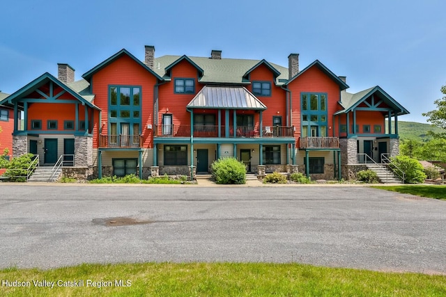6 Trailside Dr Unit A8, Hunter, NY 12442 - view of front of house with stone siding and a chimney