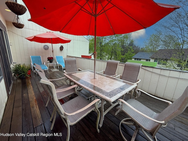 300 Pines Dr Unit 44-6, Roxbury, NY 12474 - wooden deck with outdoor dining space