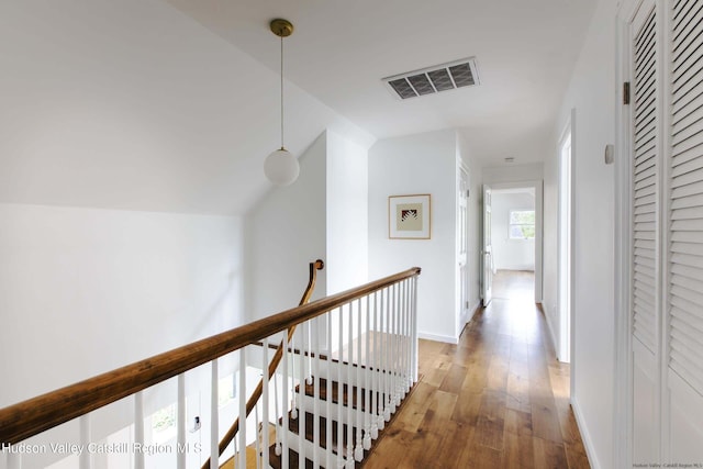 hallway featuring hardwood / wood-style flooring