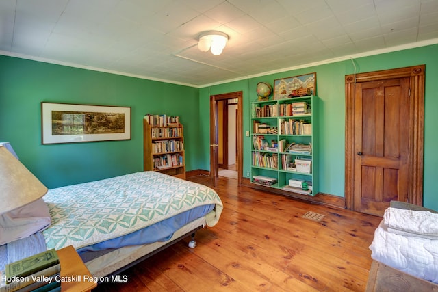 3721 Ridge Rd, Hamden, NY 13782 - bedroom featuring crown molding and wood-type flooring