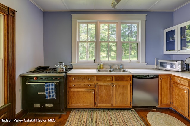 3721 Ridge Rd, Hamden, NY 13782 - kitchen featuring stainless steel dishwasher, range with gas cooktop, a sink, wood finished floors, and crown molding