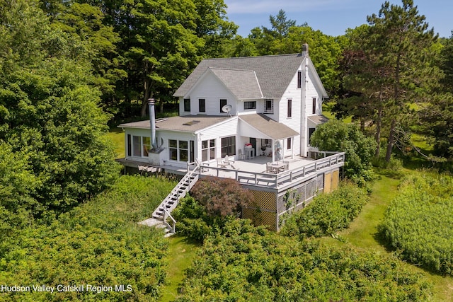 3721 Ridge Rd, Hamden, NY 13782 - rear view of property with roof with shingles, stairs, a wooden deck, and a chimney