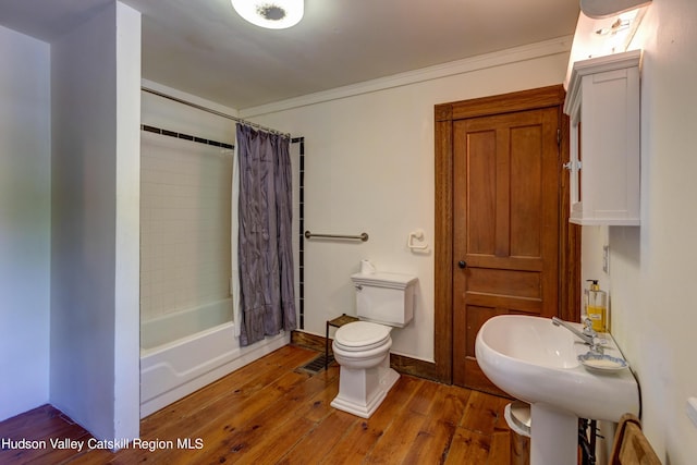 3721 Ridge Rd, Hamden, NY 13782 - full bath with toilet, wood-type flooring, crown molding, and shower / bath combo