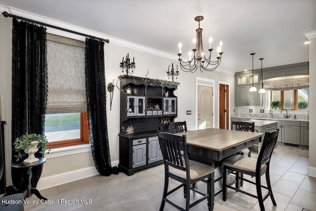1 Waddell Ave, Fort Plain, NY 13339 - dining area with light tile patterned floors, a chandelier, ornamental molding, and baseboards