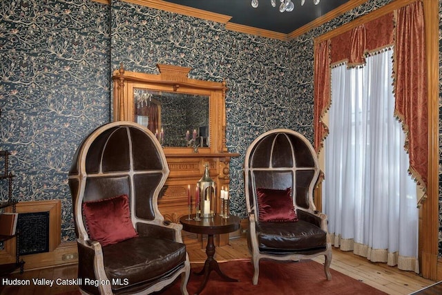 1 Waddell Ave, Fort Plain, NY 13339 - living area featuring wallpapered walls, ornamental molding, and wood-type flooring