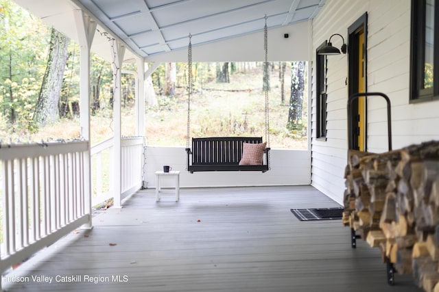 deck featuring covered porch