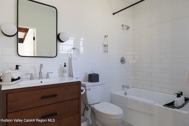 full bathroom with backsplash, vanity, tile walls, toilet, and tiled shower / bath