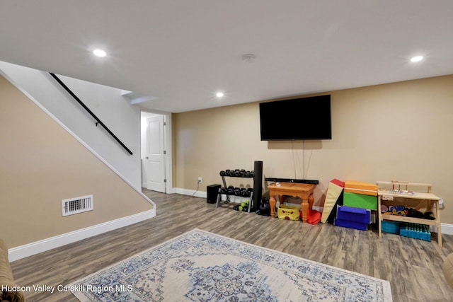 game room with wood finished floors, visible vents, recessed lighting, and baseboards
