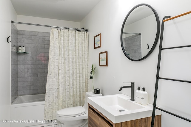 full bathroom with shower / bath combination with curtain, vanity, and toilet