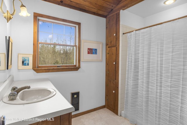 bathroom featuring vanity, tile patterned flooring, visible vents, curtained shower, and wooden ceiling