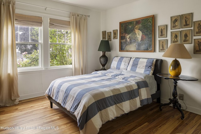 827 Union St, Hudson, NY 12534 - bedroom featuring hardwood / wood-style flooring and baseboards