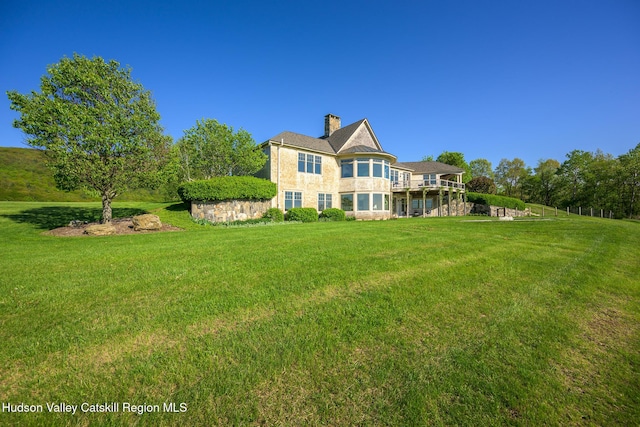 315 Weed Mine Rd, Copake, NY 12521 - rear view of house featuring a chimney and a lawn