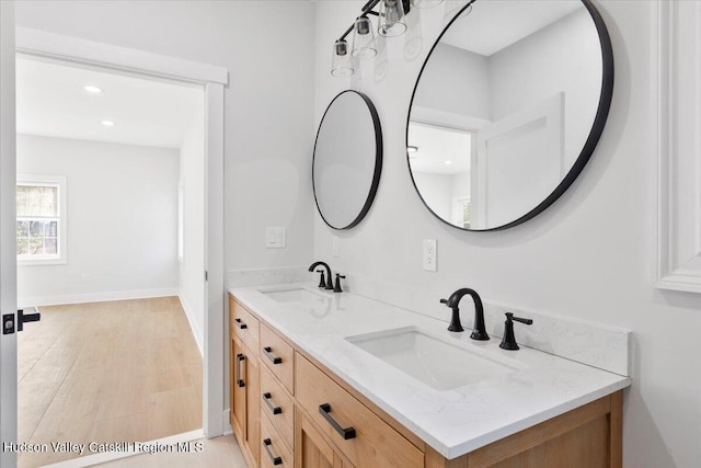 26 Debbie Dr, Athens, NY 12015 - full bath featuring recessed lighting, double vanity, a sink, and wood finished floors