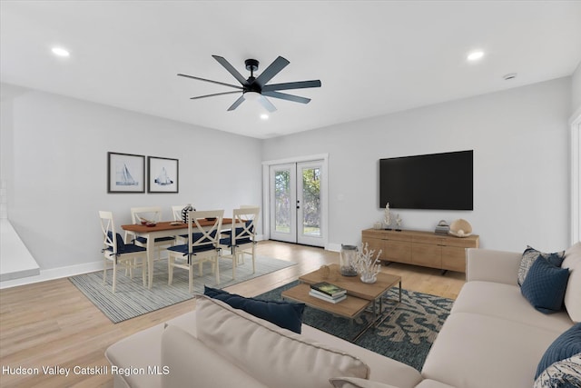 26 Debbie Dr, Athens, NY 12015 - living area featuring baseboards, recessed lighting, french doors, ceiling fan, and wood finished floors