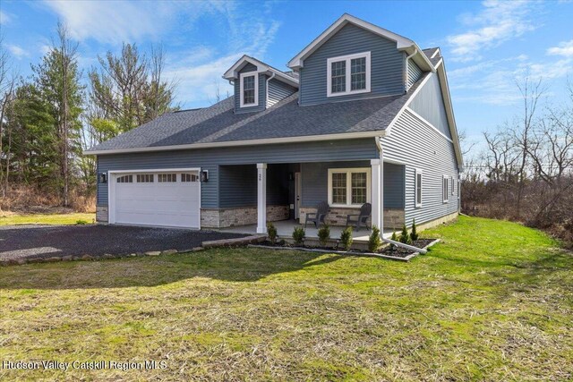 26 Debbie Dr, Athens, NY 12015 - view of front of home with an attached garage, roof with shingles, a front yard, and gravel driveway