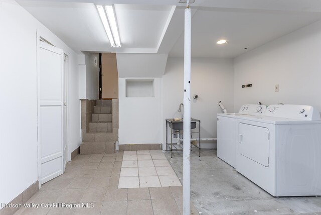 94 Tammany St, Kingston, NY 12401 - laundry room featuring washer and clothes dryer and baseboards
