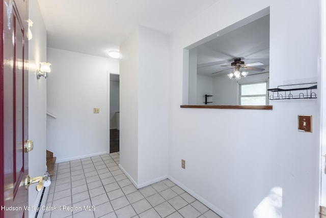 94 Tammany St, Kingston, NY 12401 - empty room with ceiling fan, baseboards, and light tile patterned floors