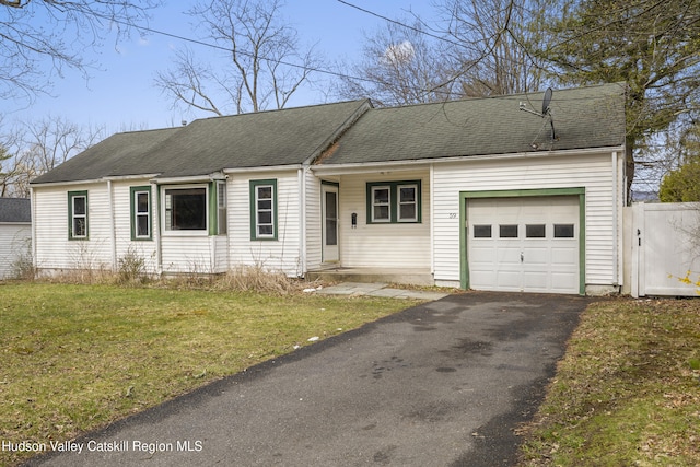 59 Elting Ave, New Paltz, NY 12561 - view of front of home featuring a garage, roof with shingles, driveway, and a front lawn