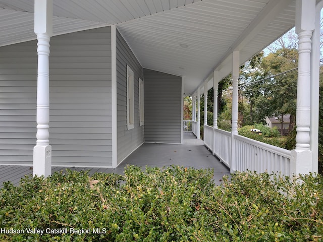 view of patio featuring a porch