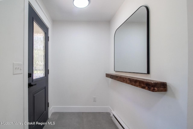 interior space with baseboards and plenty of natural light