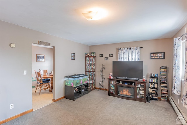 14 Montross St, Saugerties, NY 12477 - carpeted living room featuring a baseboard heating unit and baseboards