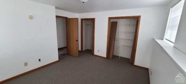 14 Montross St, Saugerties, NY 12477 - unfurnished bedroom with multiple windows, two closets, carpet flooring, and baseboards