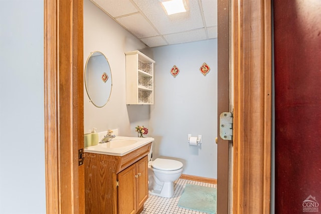 14 Montross St, Saugerties, NY 12477 - half bath featuring a drop ceiling, tile patterned flooring, toilet, and vanity
