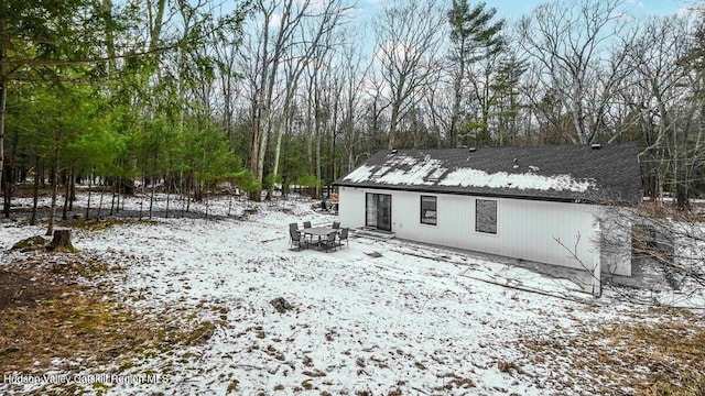 view of snow covered house