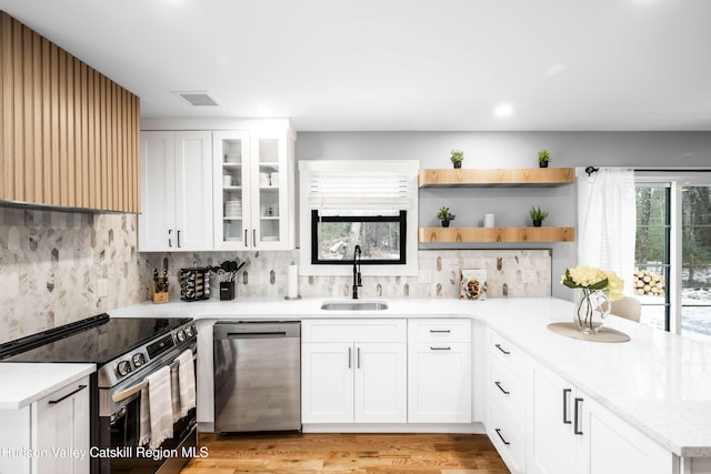 kitchen with beverage cooler, white cabinets, tasteful backsplash, stainless steel fridge with ice dispenser, and light wood-type flooring