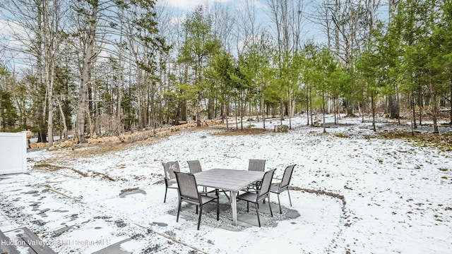 view of snow covered patio