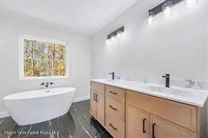 LOT13 Silo Ridge Dr, Wallkill, NY 12589 - bathroom with a freestanding bath, baseboards, and double vanity