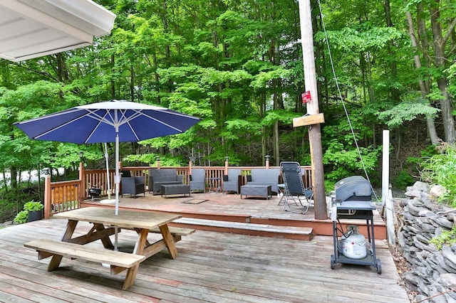 12658 Rte 23, Ashland, NY 12407 - wooden deck with a grill and outdoor dining area