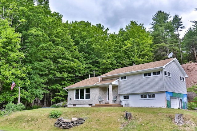 12658 Rte 23, Ashland, NY 12407 - tri-level home featuring an attached garage and a front lawn