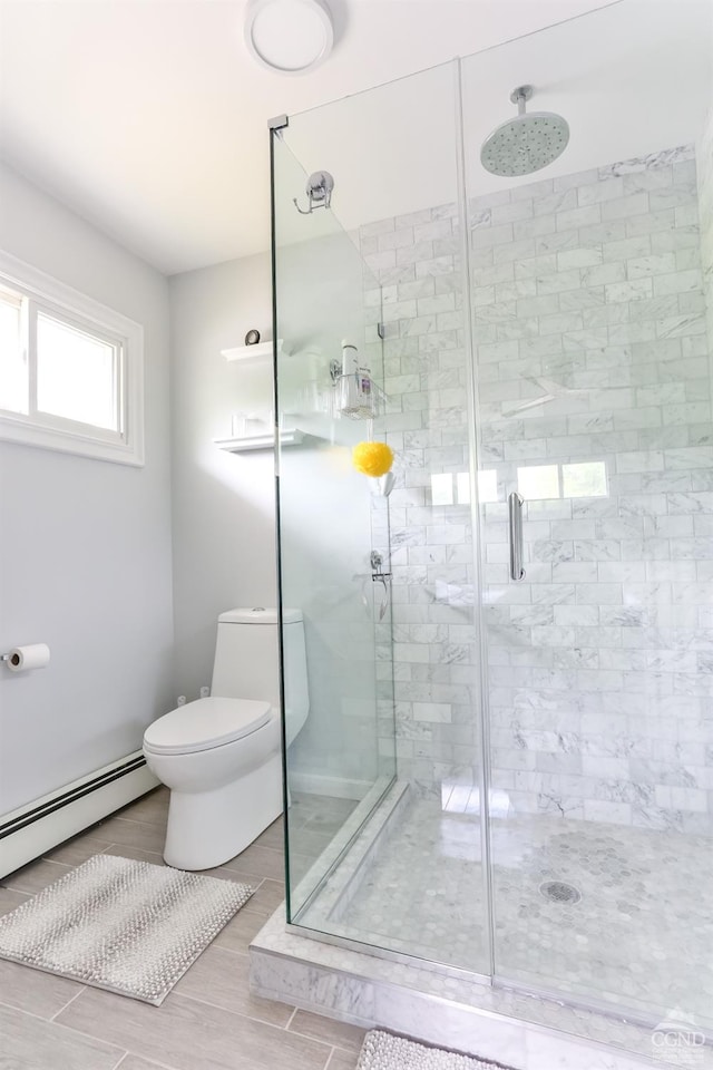 12658 Rte 23, Ashland, NY 12407 - full bath with a baseboard heating unit, a stall shower, and toilet