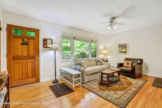 512 Watson Woods Rd, Lake Hill, NY 12448 - living area featuring a ceiling fan, light wood-style flooring, and baseboards