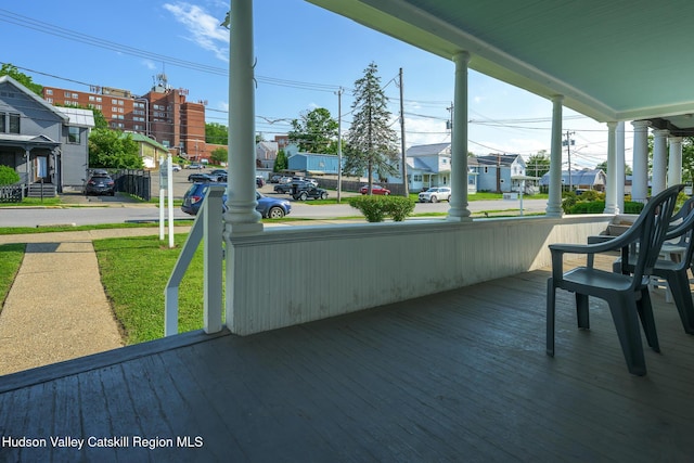 66 Green, Hudson, NY 12534 - sunroom featuring a residential view