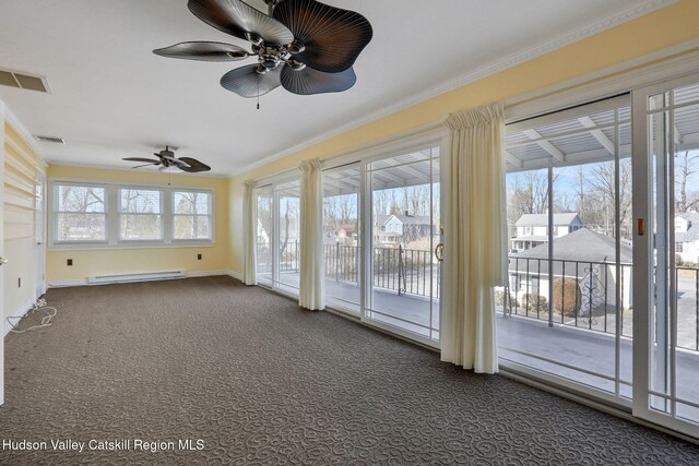 unfurnished sunroom with a baseboard heating unit and visible vents