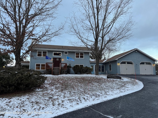 212 S St, Windham, NY 12496 - split foyer home with a garage and driveway