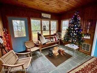 212 S St, Windham, NY 12496 - sitting room featuring wood ceiling and wood walls