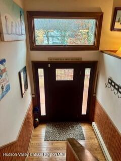 212 S St, Windham, NY 12496 - entryway featuring light wood-style floors and wainscoting