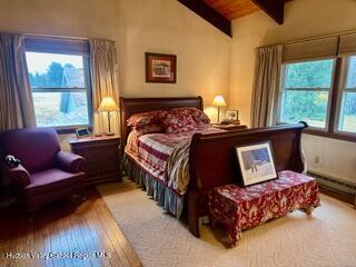 212 S St, Windham, NY 12496 - bedroom featuring hardwood / wood-style flooring and wooden ceiling