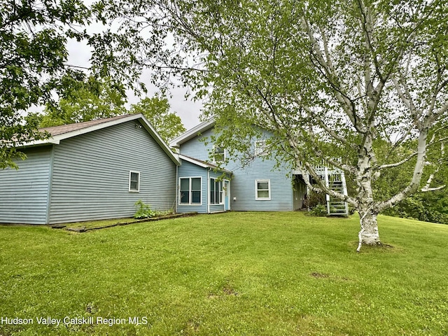 212 S St, Windham, NY 12496 - back of property with a lawn