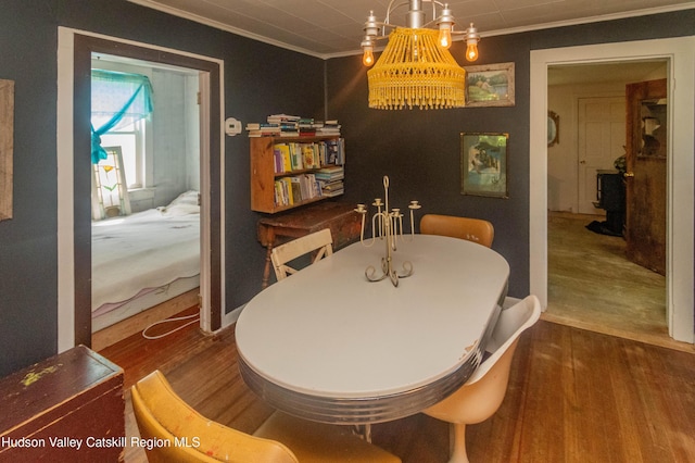 73 Cauterskill Ave, Catskill, NY 12414 - dining space featuring crown molding and wood finished floors