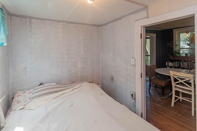 73 Cauterskill Ave, Catskill, NY 12414 - bedroom with wood finished floors and wooden walls