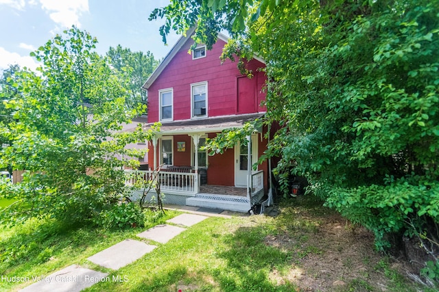 73 Cauterskill Ave, Catskill, NY 12414 - view of front of property with covered porch